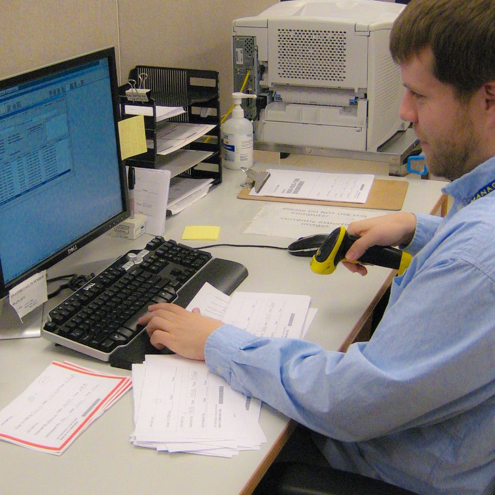 MMRA employee scanning on-site